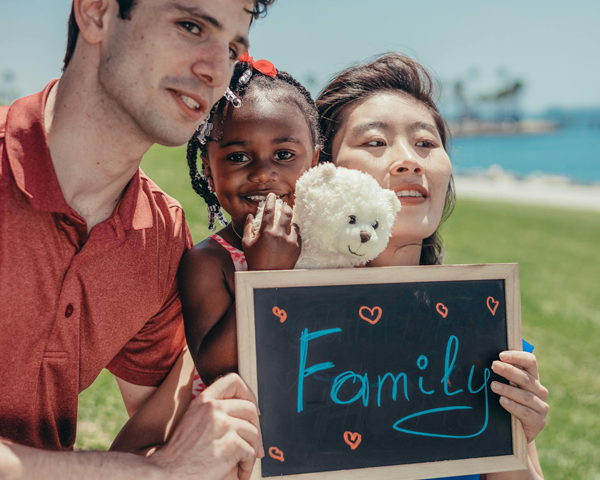 Foster Family with Sign