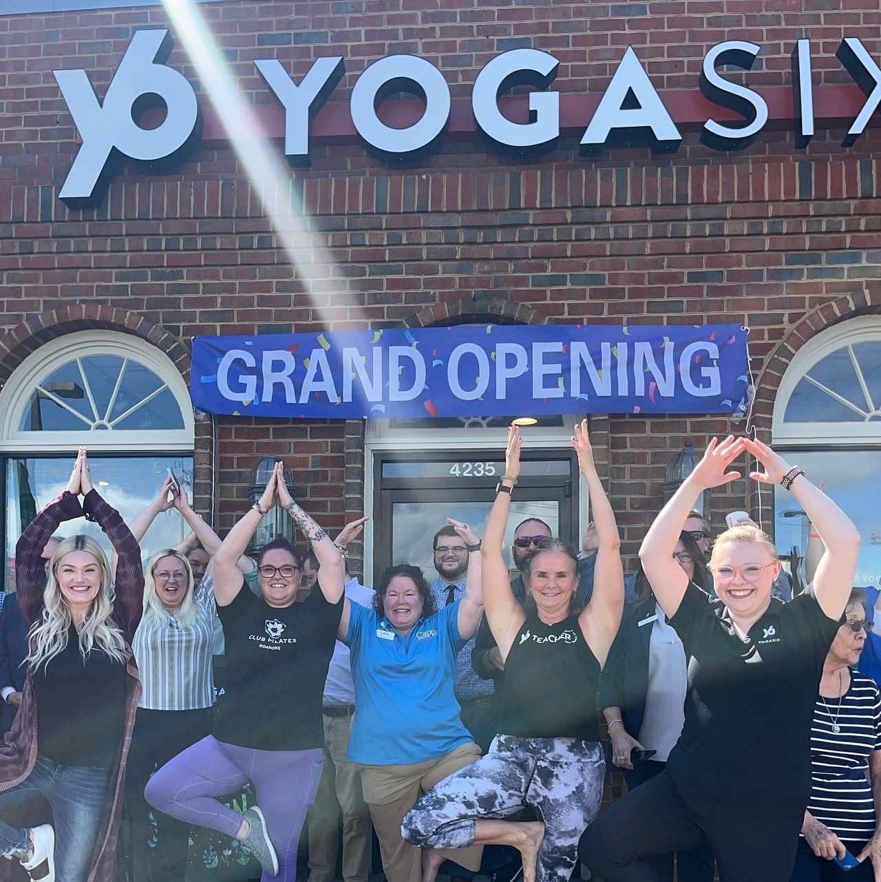 Grand opening of YogaSix business.
